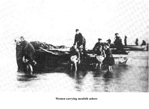 A woman's work was never done - carrying men onto the boats